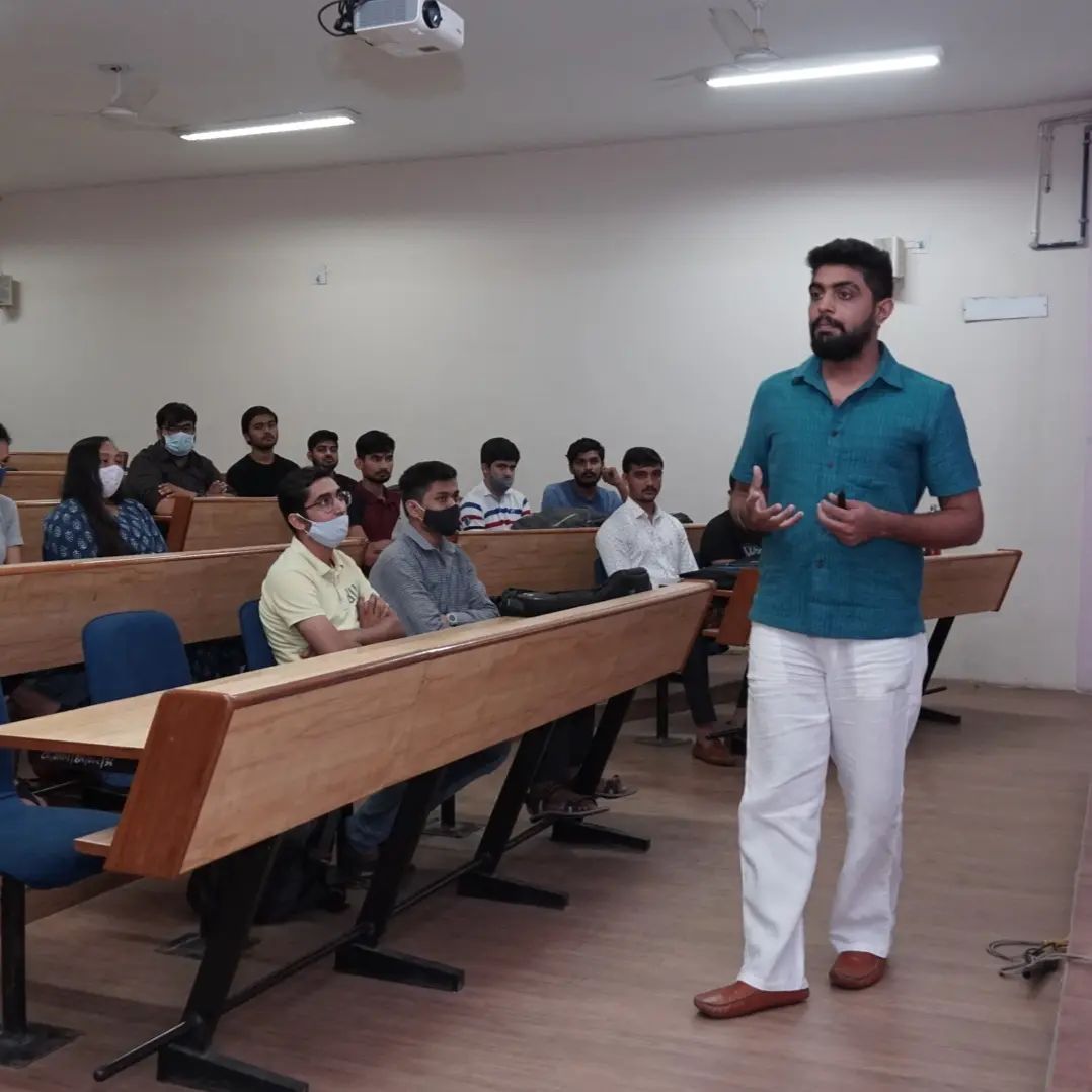 Prinkit Patel conducting a seminar with audience engagement